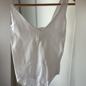 Bodysuite in white.